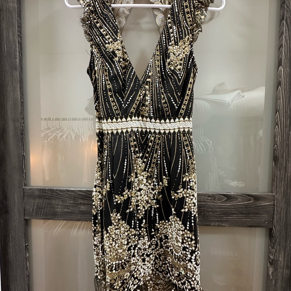 Elegant Black and Gold Embellished Dress